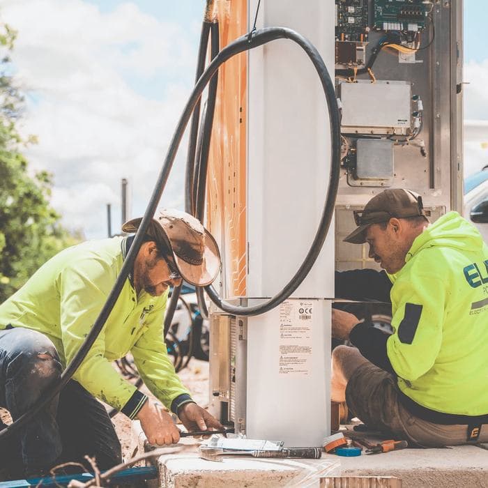 Electricians working on site